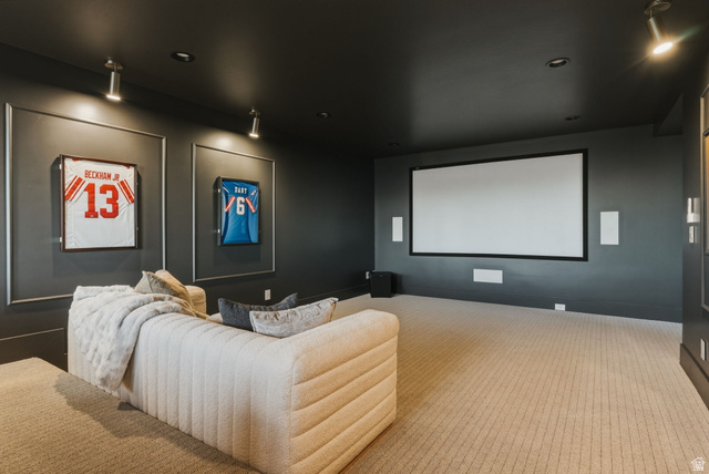 923 North Emery Lane Elk Ridge, UT 84651 - Photo 75 of 101 Dedicated media room featuring a large projector screen, built-in wall speakers, and recessed ceiling lighting