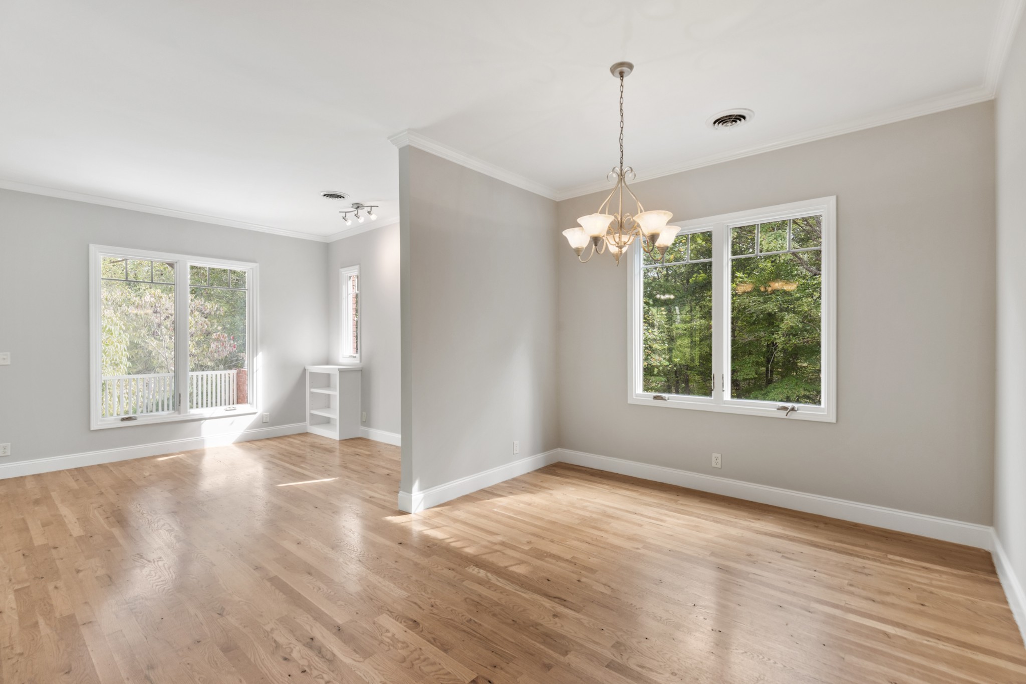 2294 Daniels Road Greenbrier, TN 37073 - Photo 12 of 52 a view of an empty room with wooden floor and a window