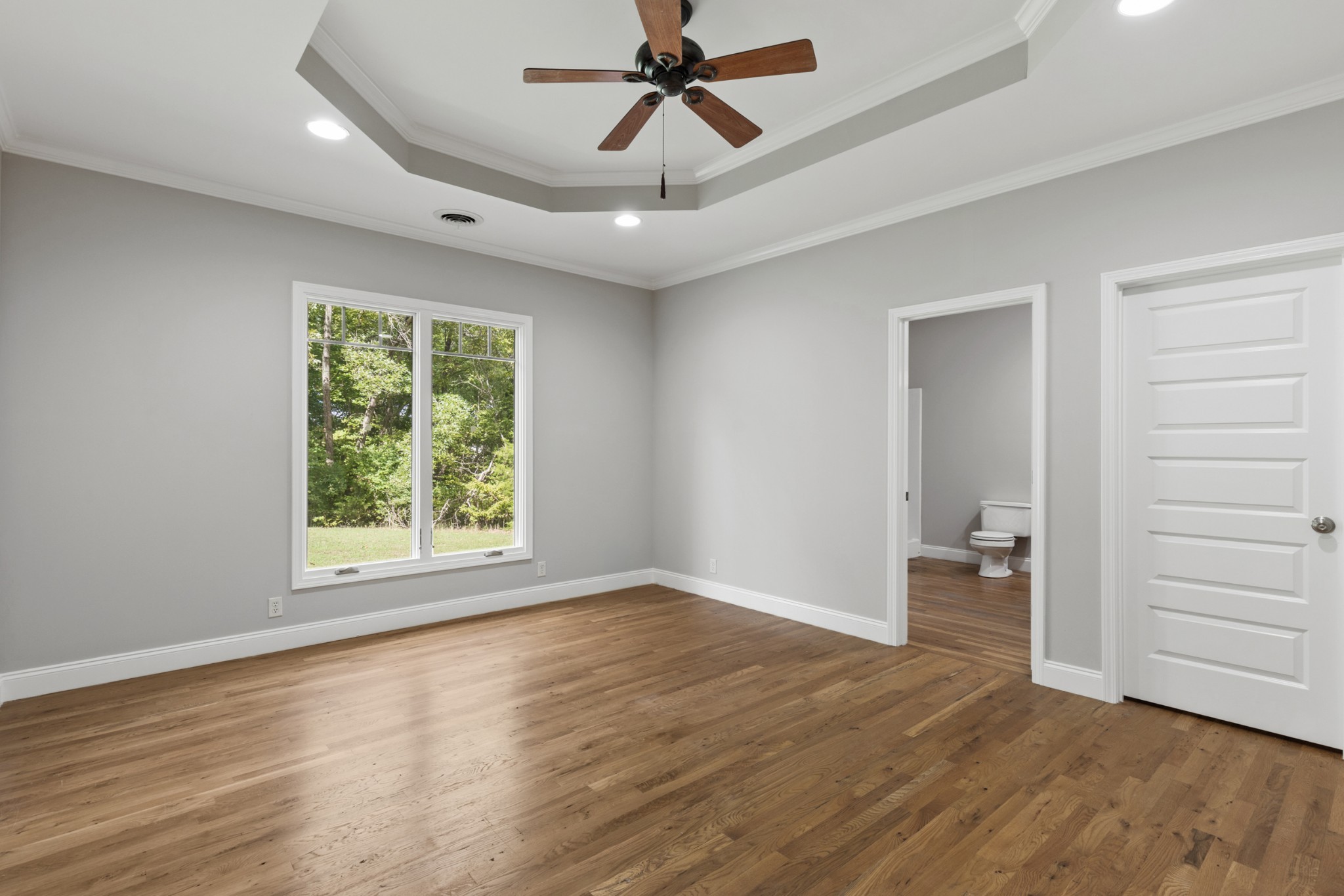 2294 Daniels Road Greenbrier, TN 37073 - Photo 26 of 52 wooden floor in an empty room with a window