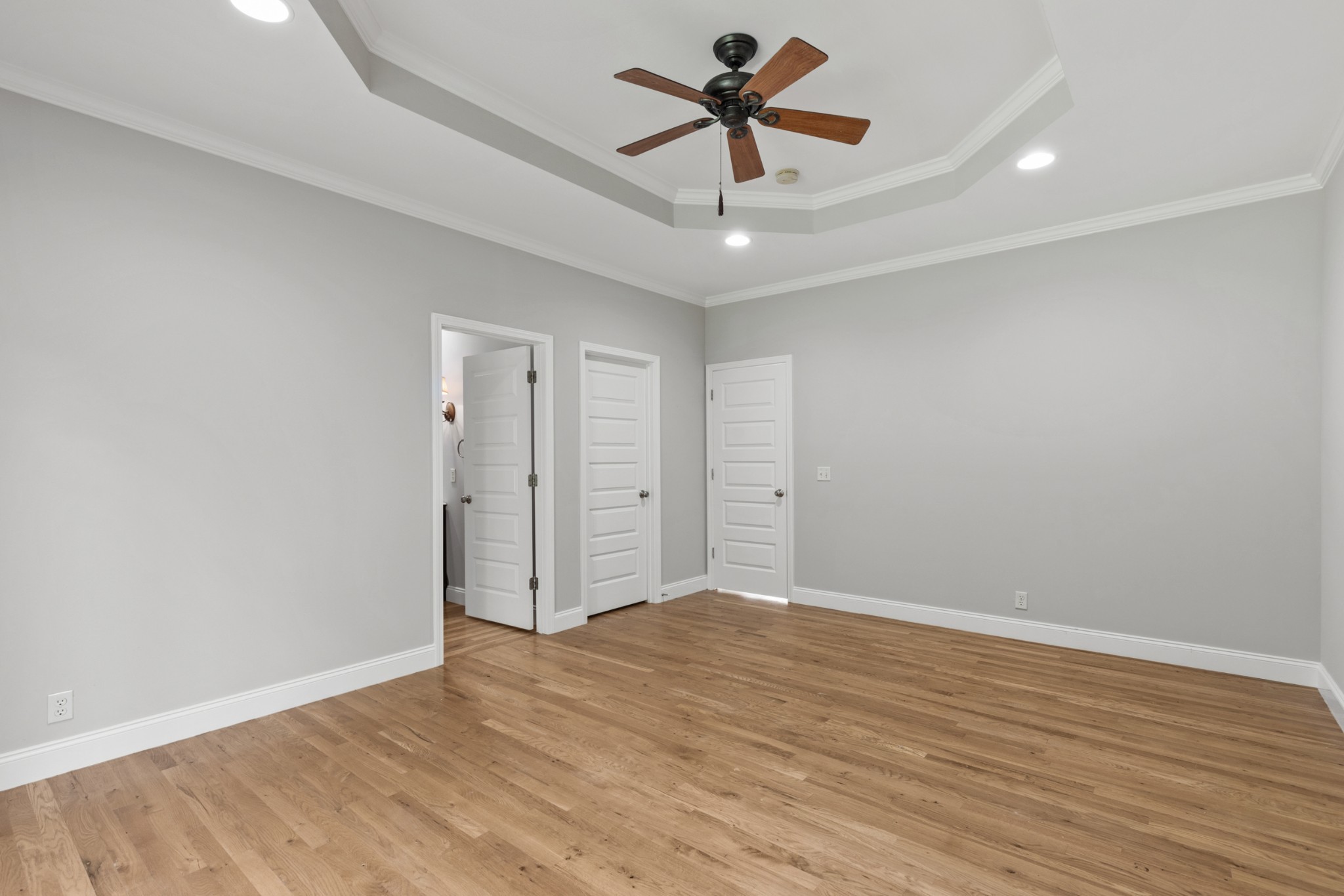 2294 Daniels Road Greenbrier, TN 37073 - Photo 27 of 52 a view of a big room with wooden floor and a ceiling fan
