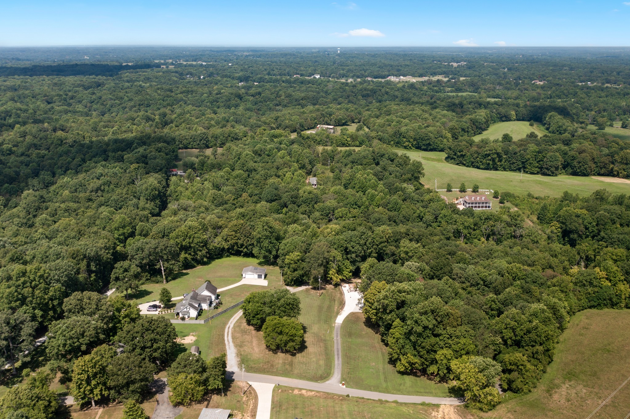 2294 Daniels Road Greenbrier, TN 37073 - Photo 52 of 52 an aerial view of residential houses with outdoor space and trees