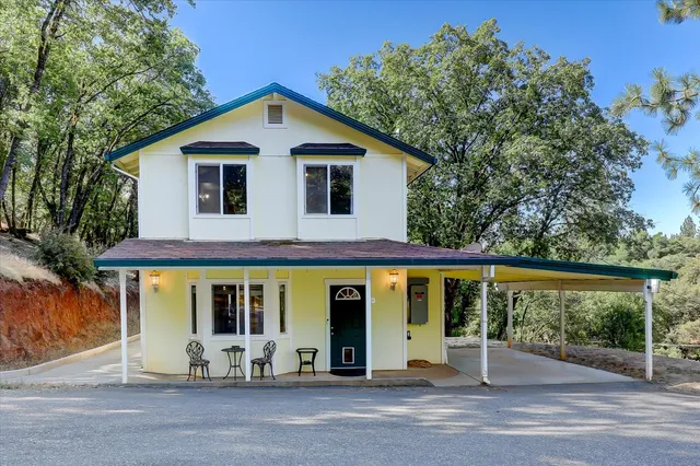 a front view of a house with a porch
