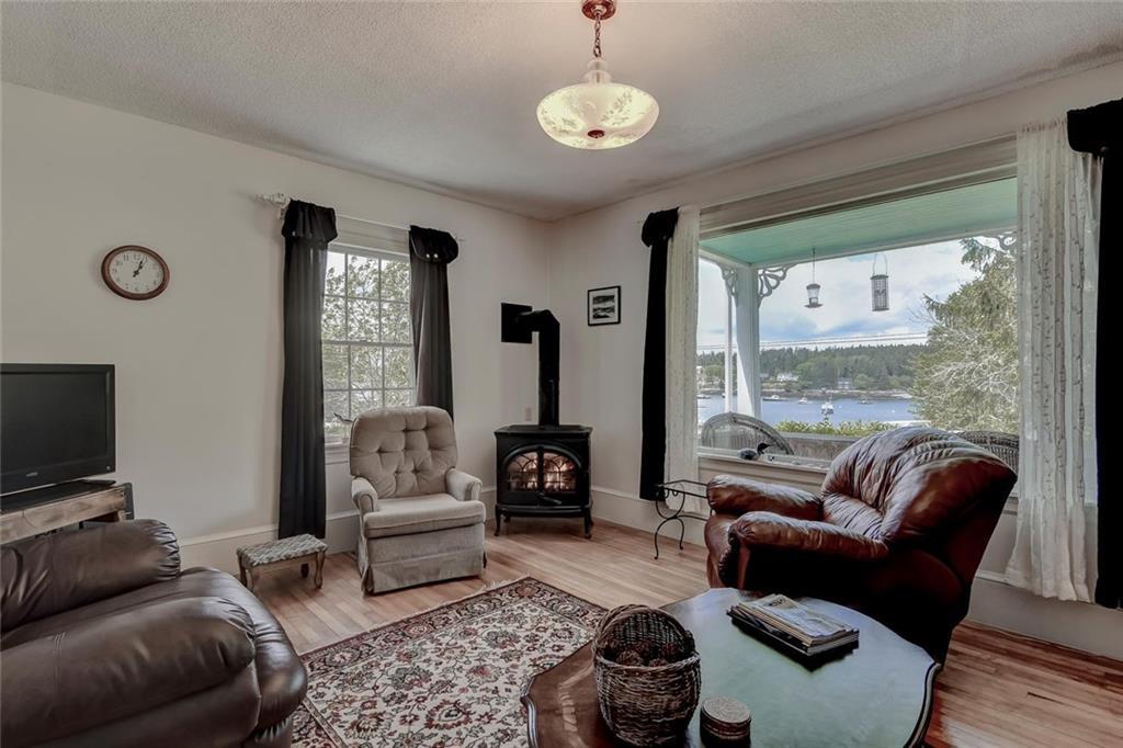 38 Fifield Point Road Stonington, ME 04681 - Photo 19 of 41 Living Room - Check out the view...