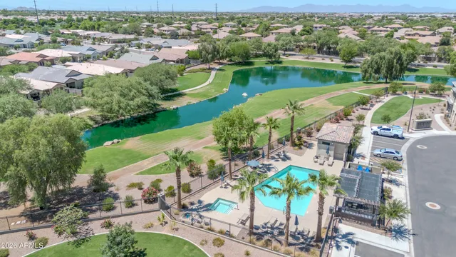 an aerial view of a city with lake view