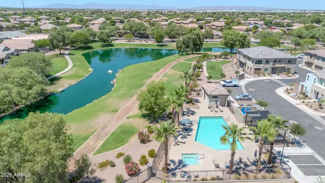 an aerial view of a city with lake view