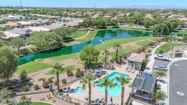 an aerial view of a city with lake view
