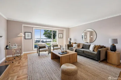 a kitchen with a sink stainless steel appliances and cabinets