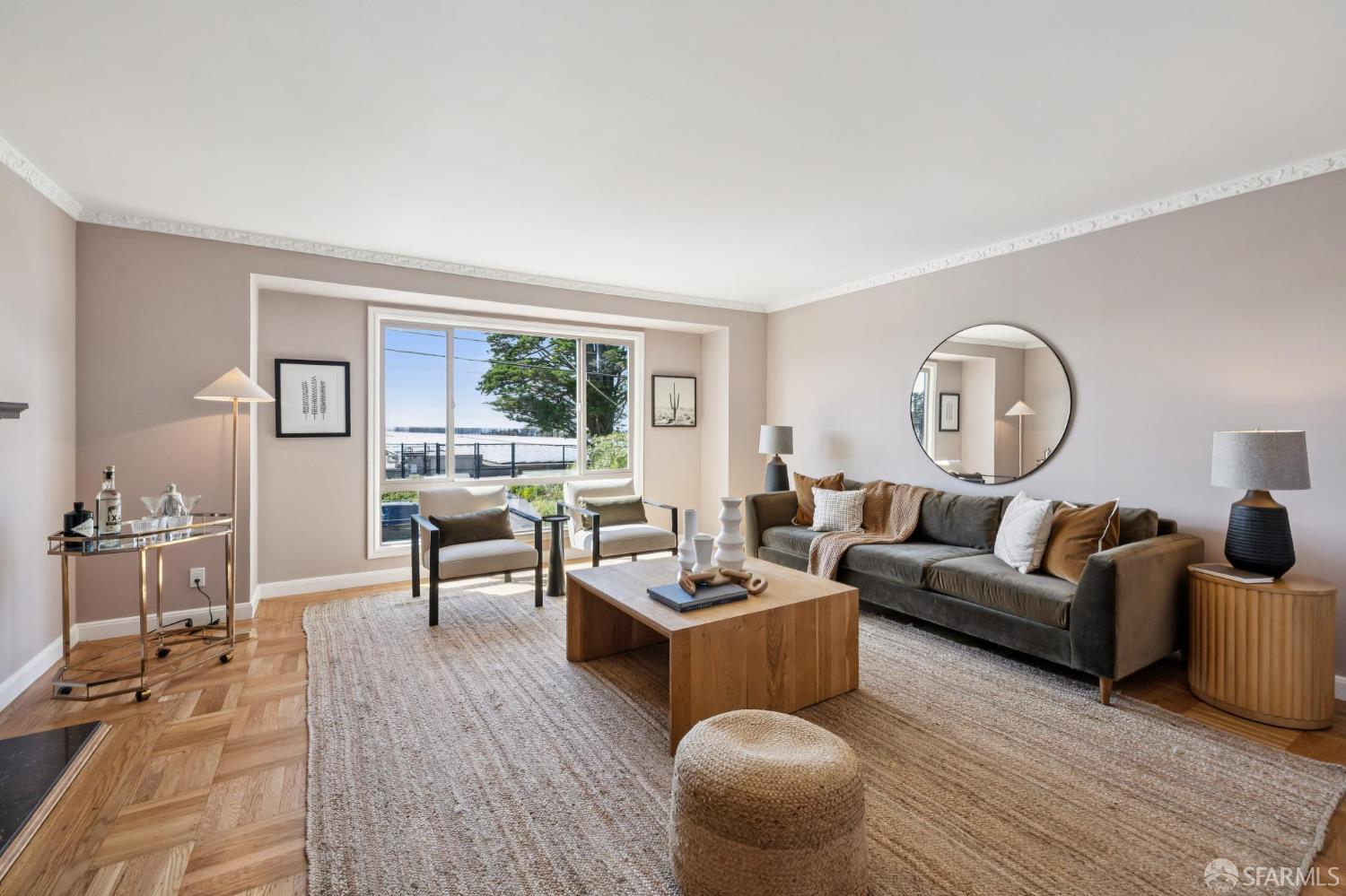 1942 24th Avenue San Francisco, CA 94116 - Photo 13 of 84 a living room with furniture a rug potted plant and a large window