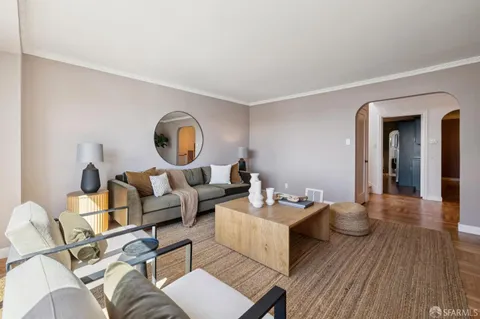 a kitchen with stainless steel appliances granite countertop a stove microwave and sink