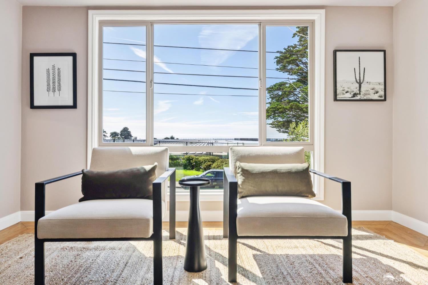 1942 24th Avenue San Francisco, CA 94116 - Photo 17 of 84 a living room with furniture and a window