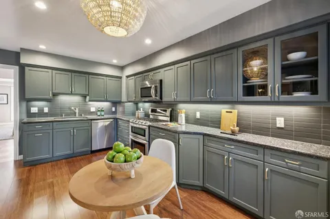 a bed room with a bed and a large window