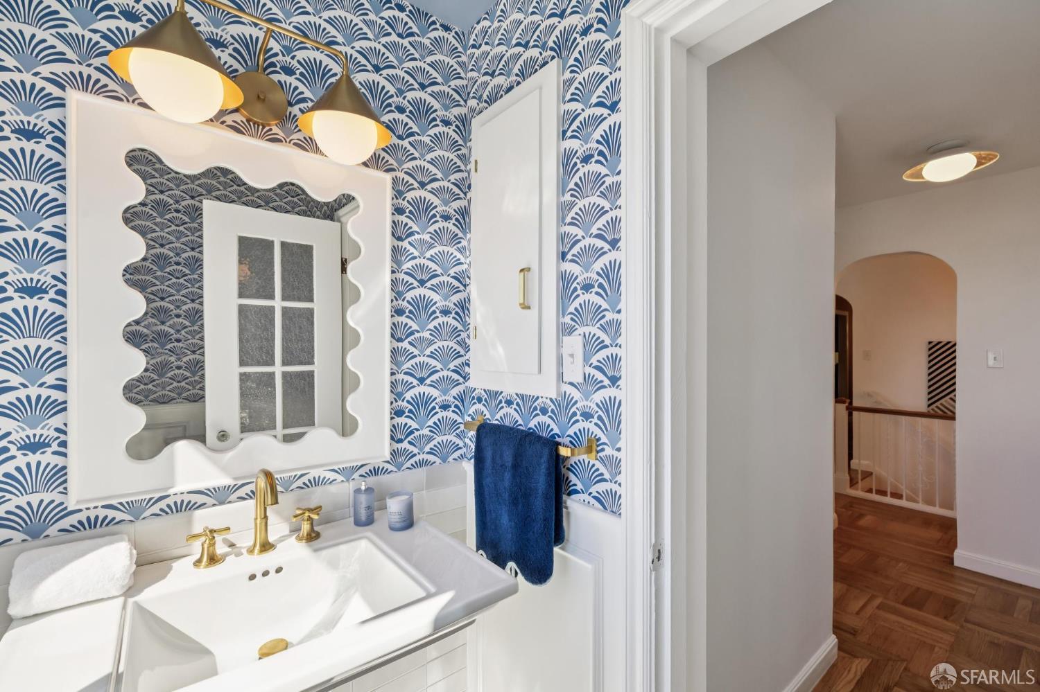 1942 24th Avenue San Francisco, CA 94116 - Photo 38 of 84 a bathroom with a sink and a mirror