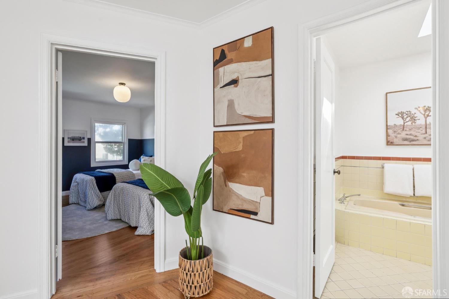 1942 24th Avenue San Francisco, CA 94116 - Photo 52 of 84 a living room with furniture and a potted plant