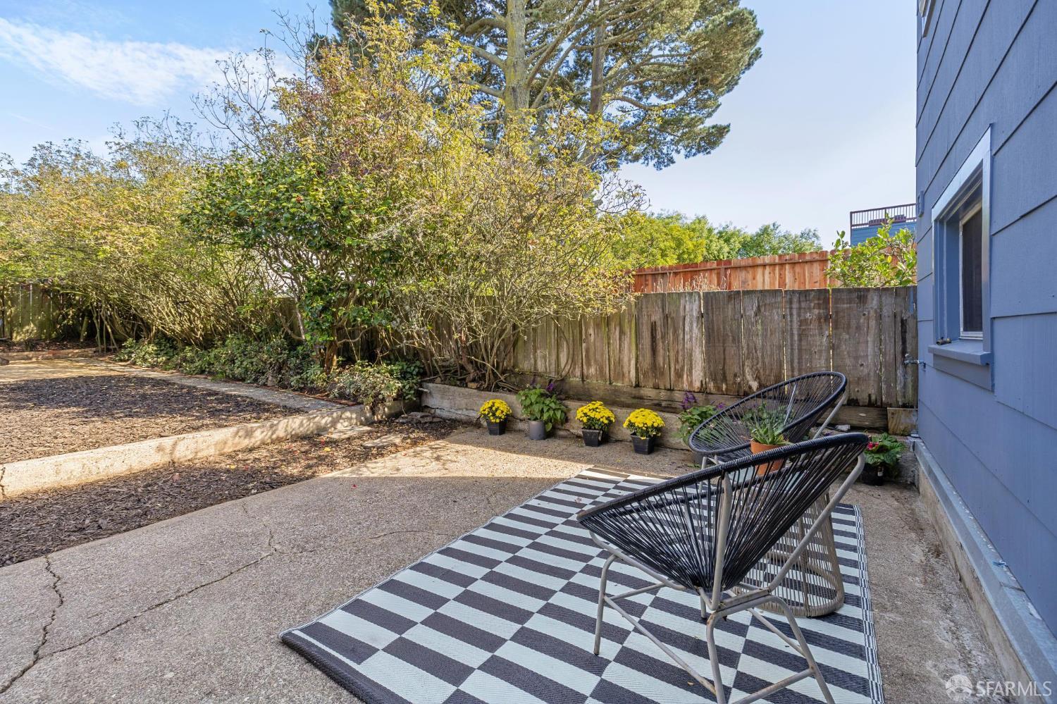 1942 24th Avenue San Francisco, CA 94116 - Photo 69 of 84 a view of a roof deck with wooden fence and a bench