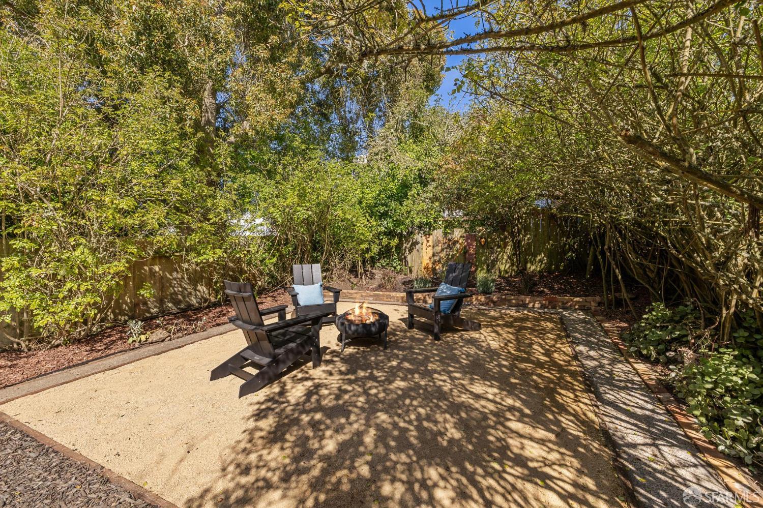 1942 24th Avenue San Francisco, CA 94116 - Photo 72 of 84 a backyard of a house with table and chairs