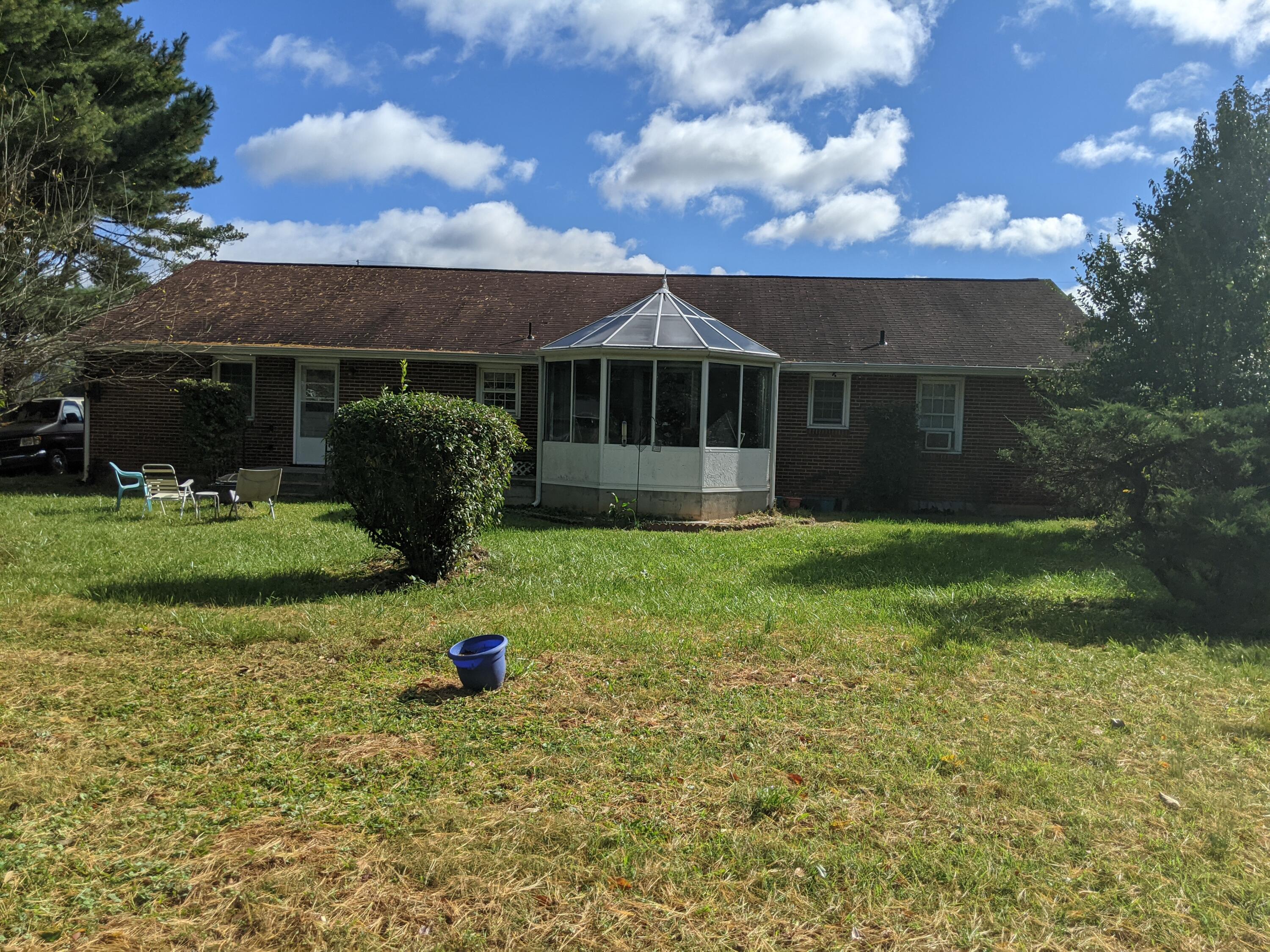 2132 Ranch Road Northwest Roanoke, VA 24017 - Photo 2 of 15 a front view of a house with garden