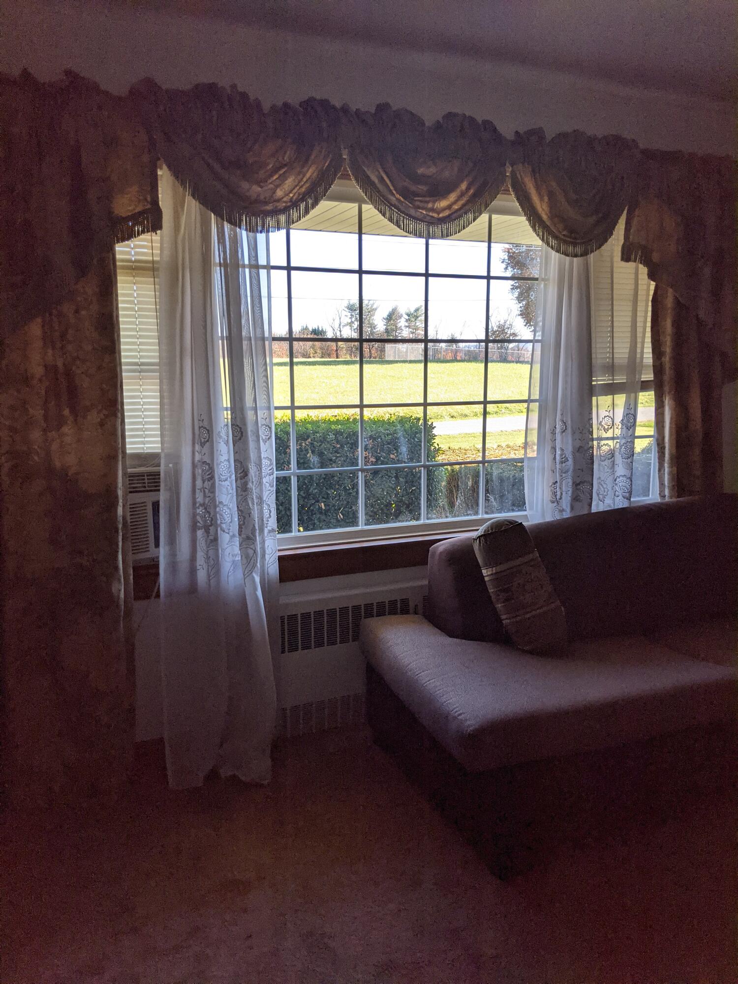 2132 Ranch Road Northwest Roanoke, VA 24017 - Photo 10 of 15 a living room with furniture and a large window