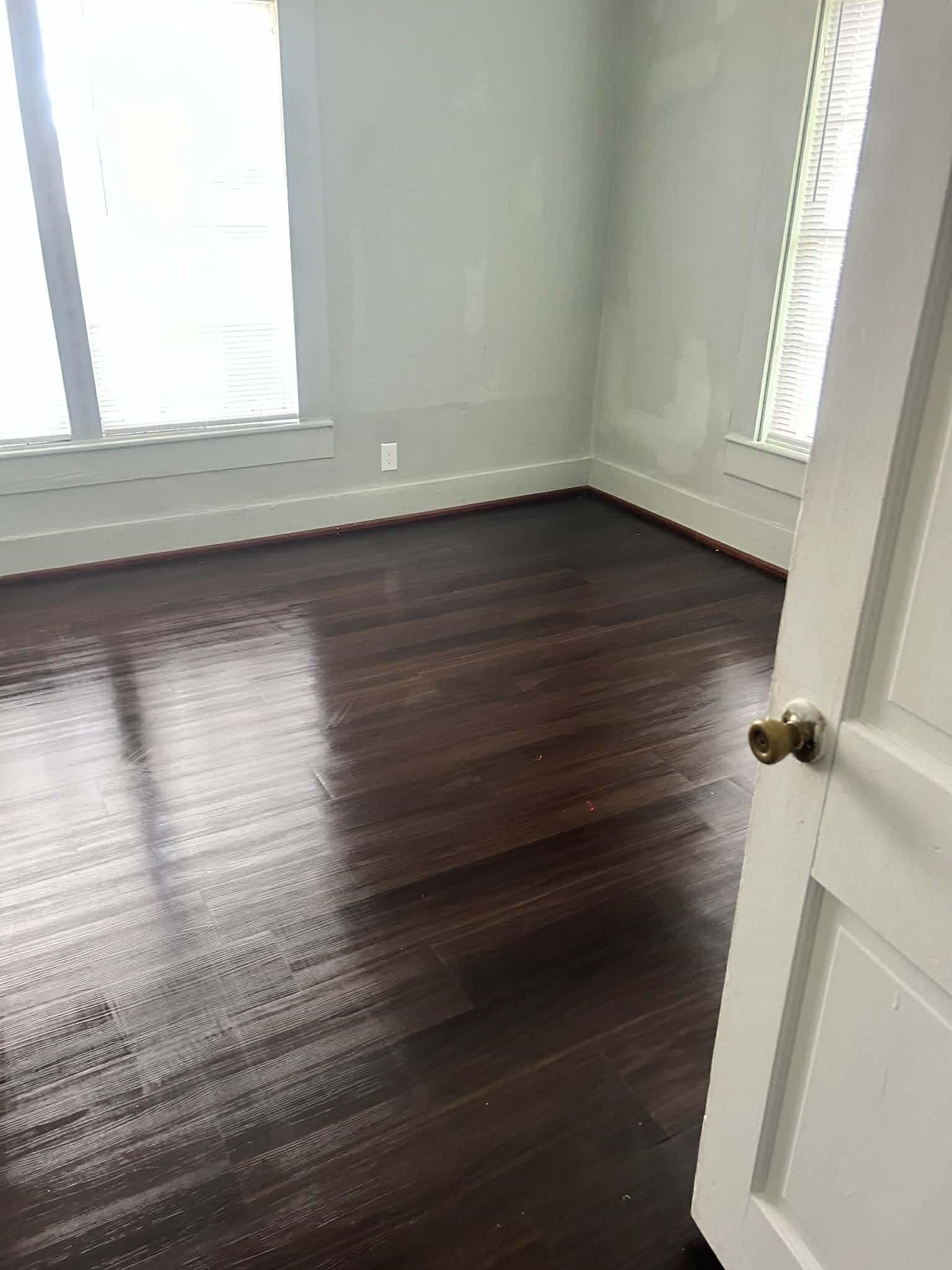 11 Smith Street Shepherd, TX 77371 - Photo 22 of 31 a view of empty room with wooden floor and fan