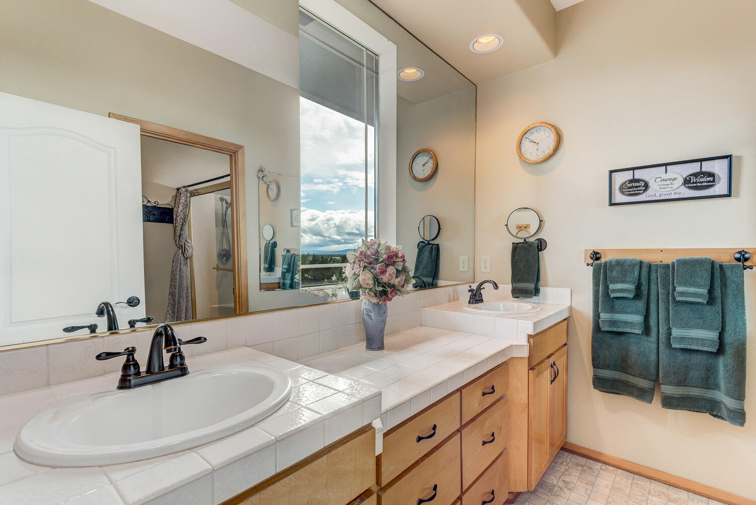 2434 Southwest 34th Drive Redmond, OR 97756 - Photo 19 of 36 a bathroom with a sink double vanity and a mirror