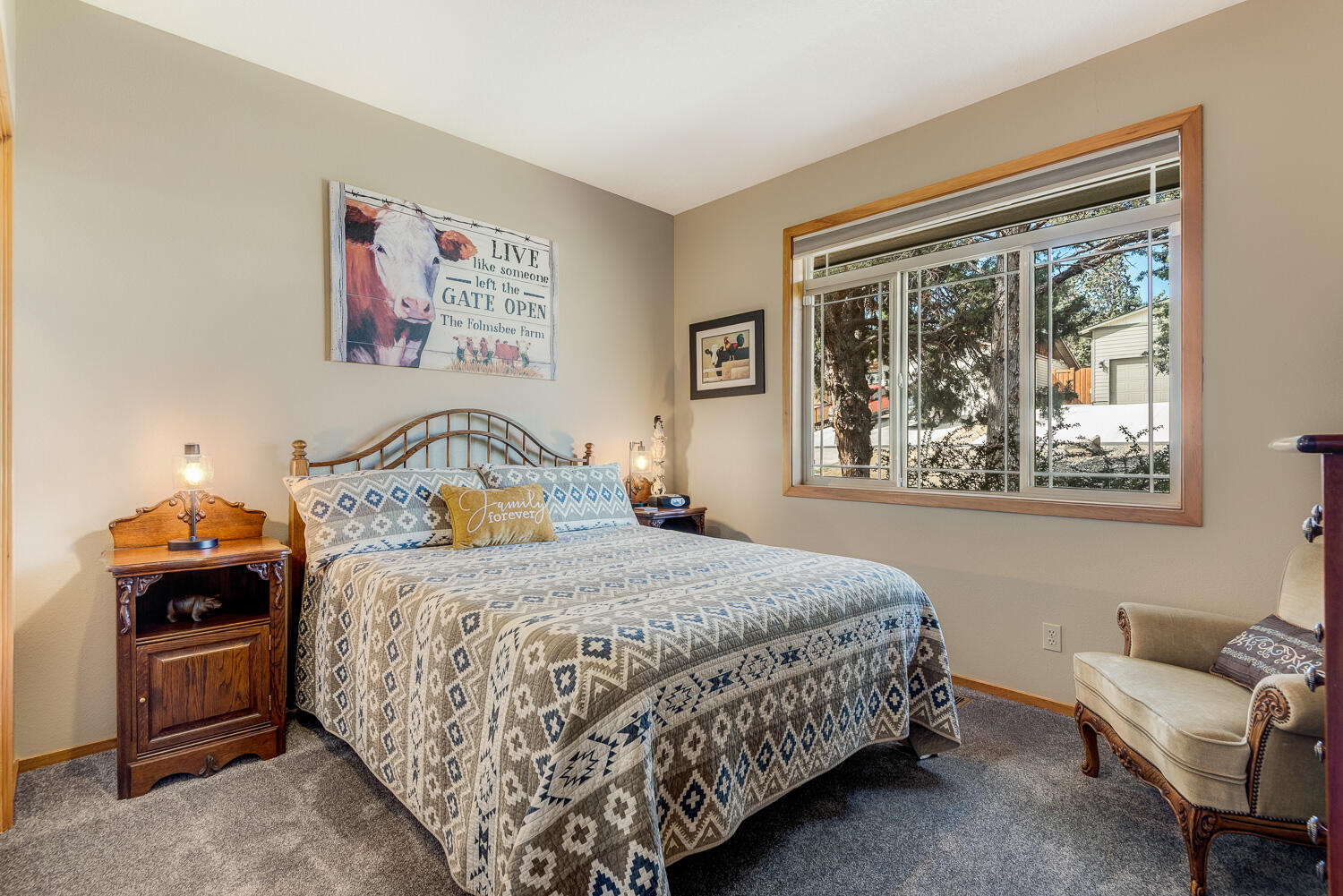 2434 Southwest 34th Drive Redmond, OR 97756 - Photo 21 of 36 a bedroom with a bed and a window