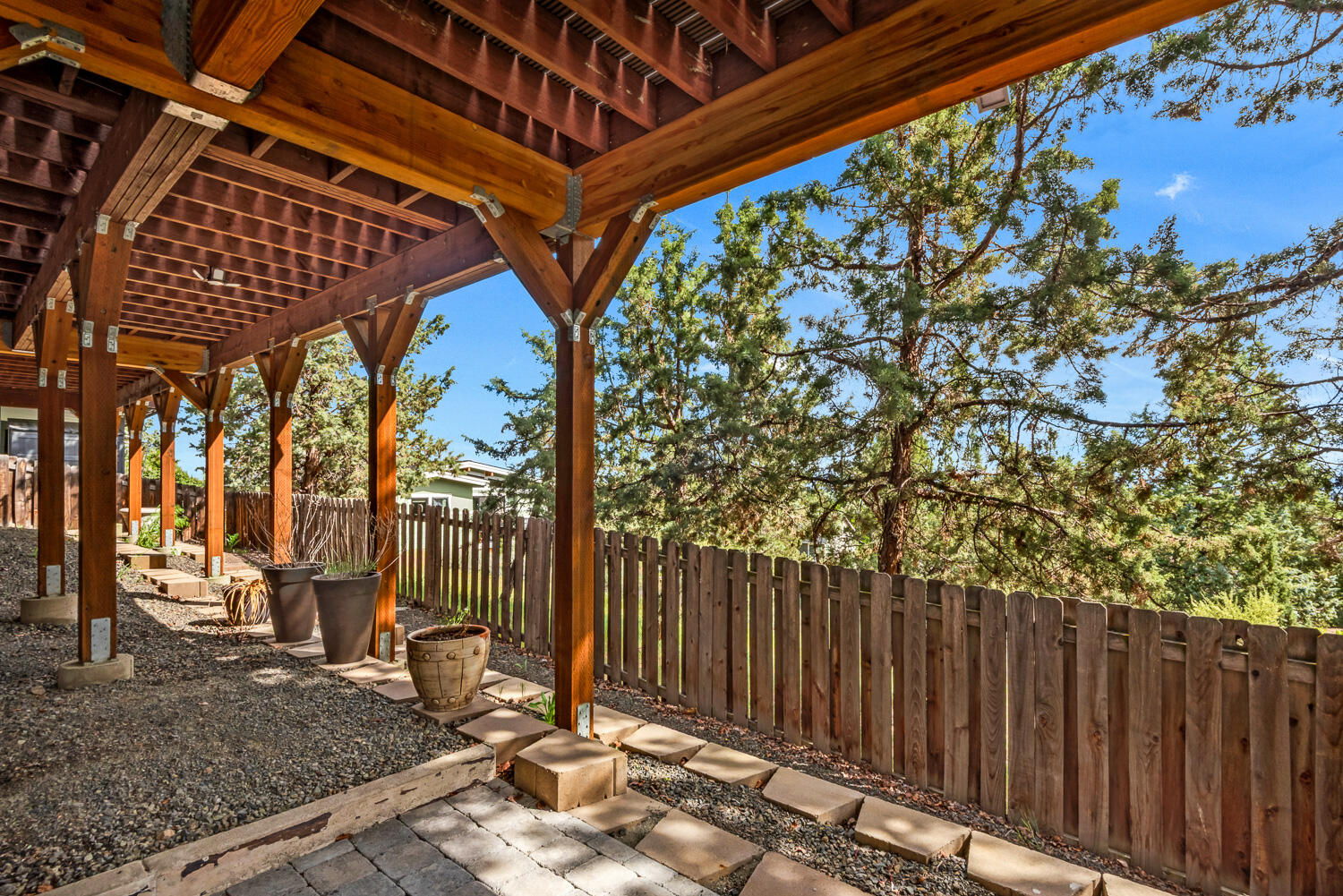 2434 Southwest 34th Drive Redmond, OR 97756 - Photo 32 of 36 a view of a backyard with wooden fence