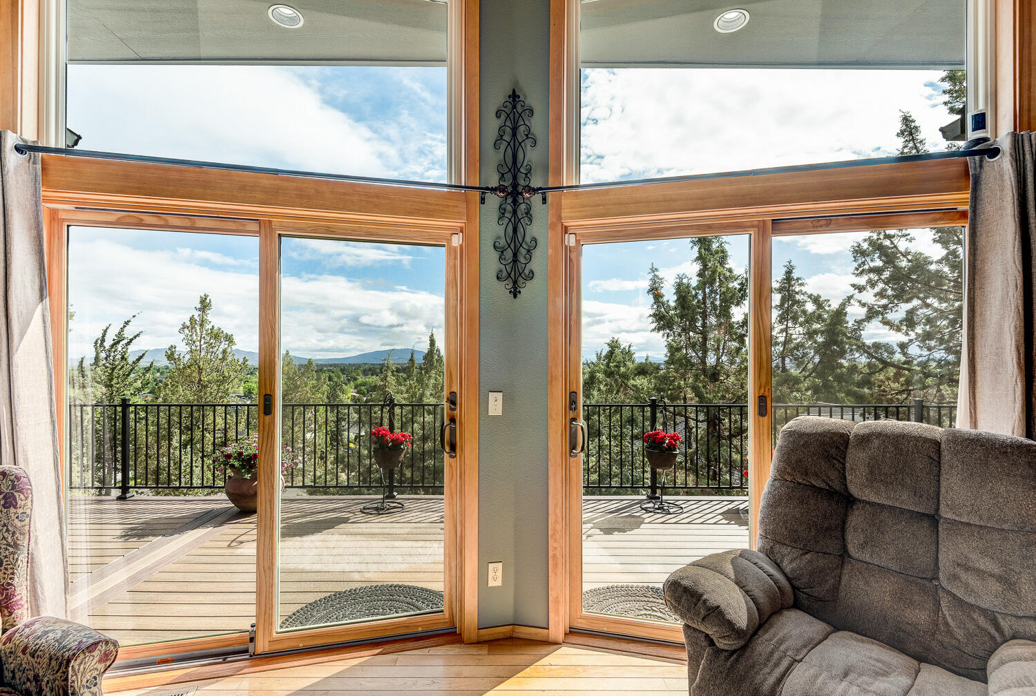 2434 Southwest 34th Drive Redmond, OR 97756 - Photo 6 of 36 a living room filled with furniture and a floor to ceiling window
