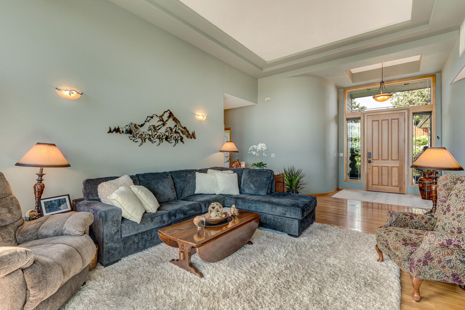 2434 Southwest 34th Drive Redmond, OR 97756 - Photo 8 of 36 a living room with furniture and a lamp