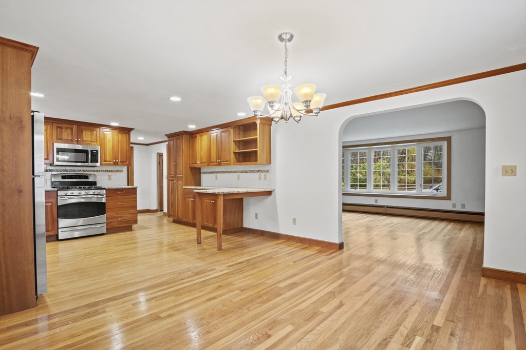 116 Waverly Street Ashland, MA 01721 - Photo 13 of 35 a view of a kitchen with a sink and microwave