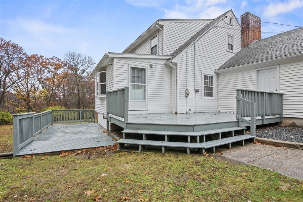 116 Waverly Street Ashland, MA 01721 - Photo 29 of 35 a view of a house with a balcony and stairs