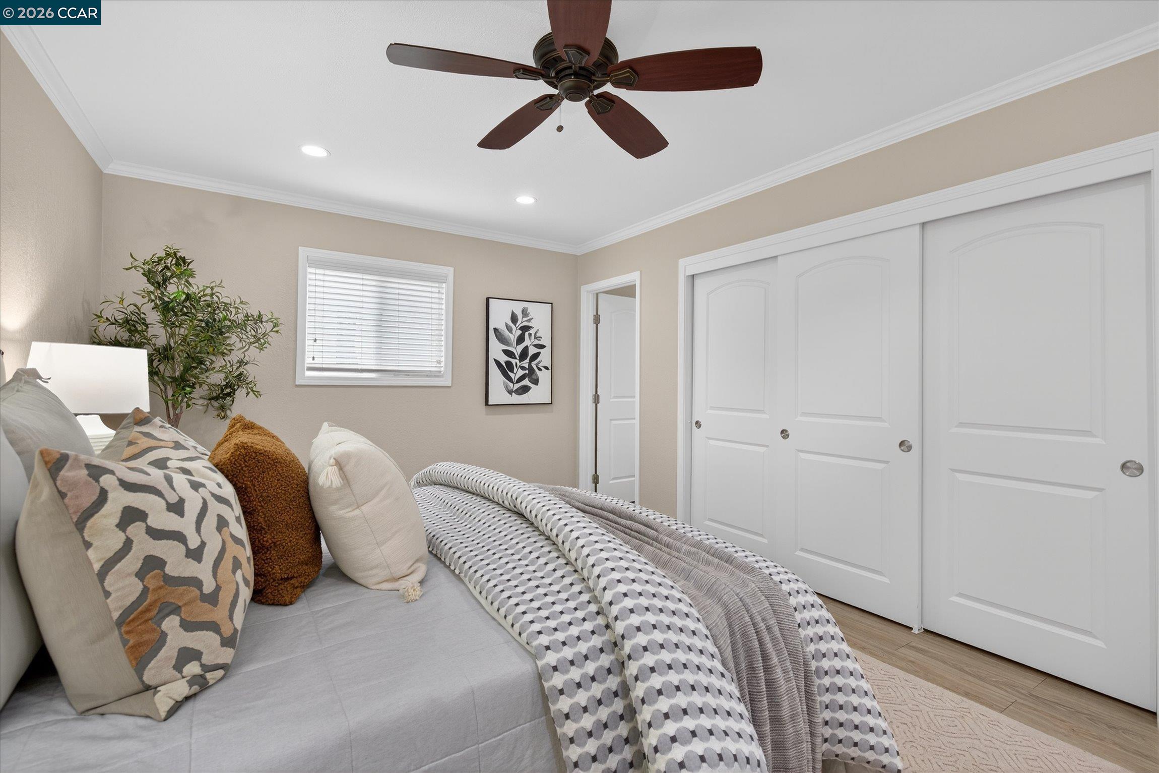 4092 Nulty Drive Concord, CA 94521 - Photo 16 of 33 a bedroom with a bed and a chandelier