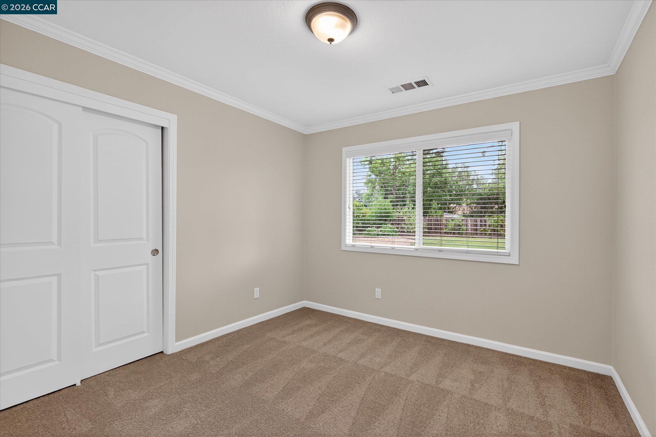 4092 Nulty Drive Concord, CA 94521 - Photo 20 of 33 an empty room with windows and closet