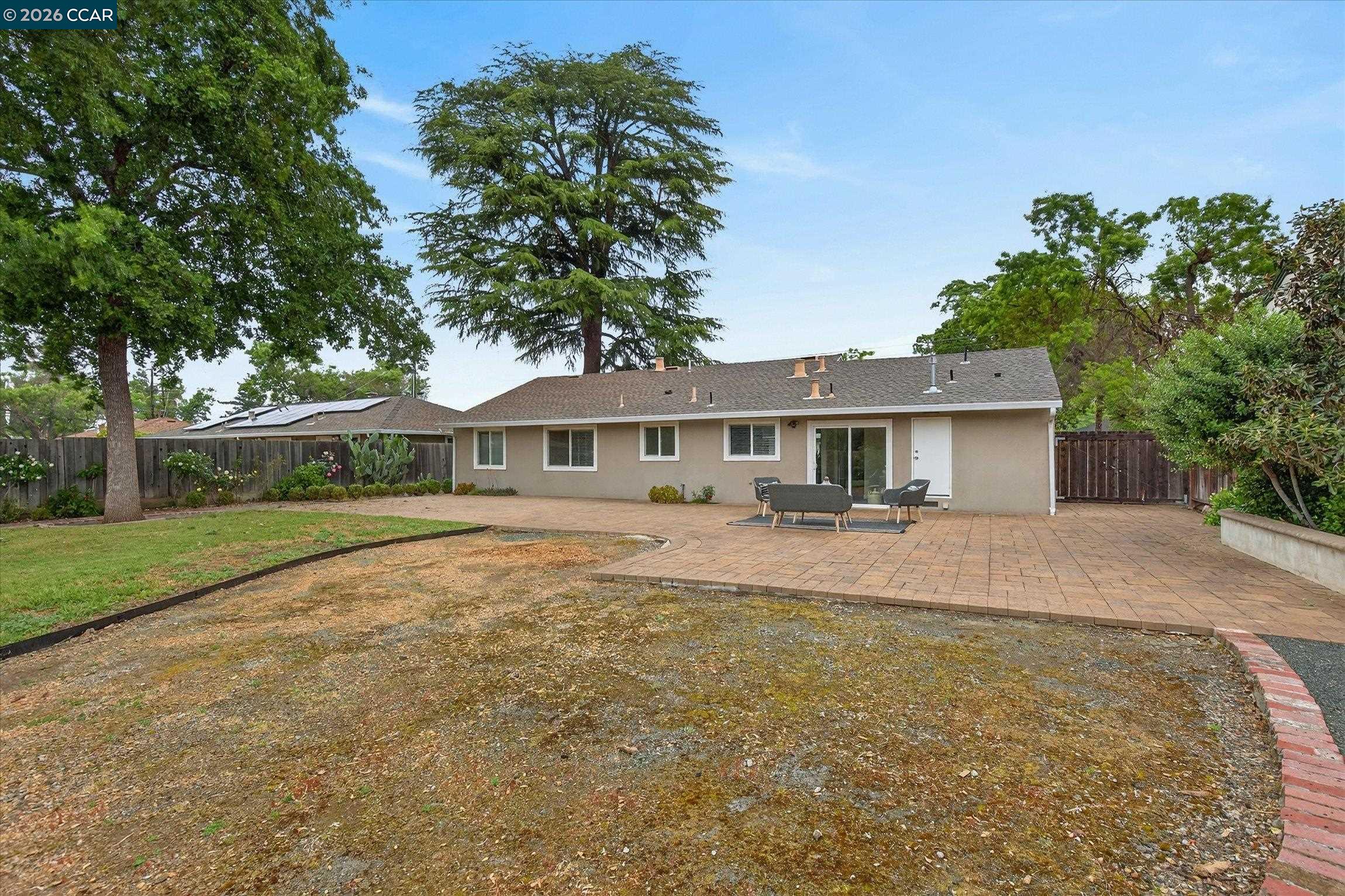 4092 Nulty Drive Concord, CA 94521 - Photo 23 of 33 a front view of house with yard and trees in the background