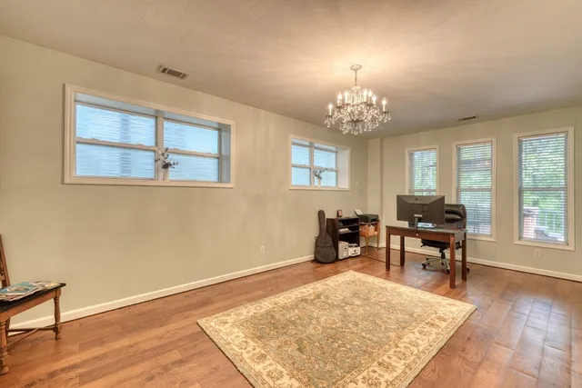 a view of a livingroom kitchen and dining room