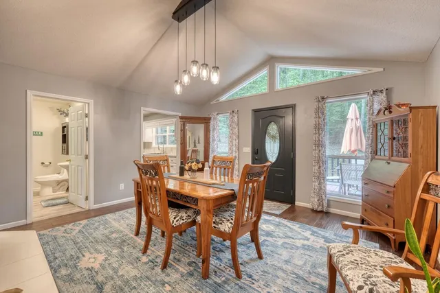 a view of a dining room with furniture