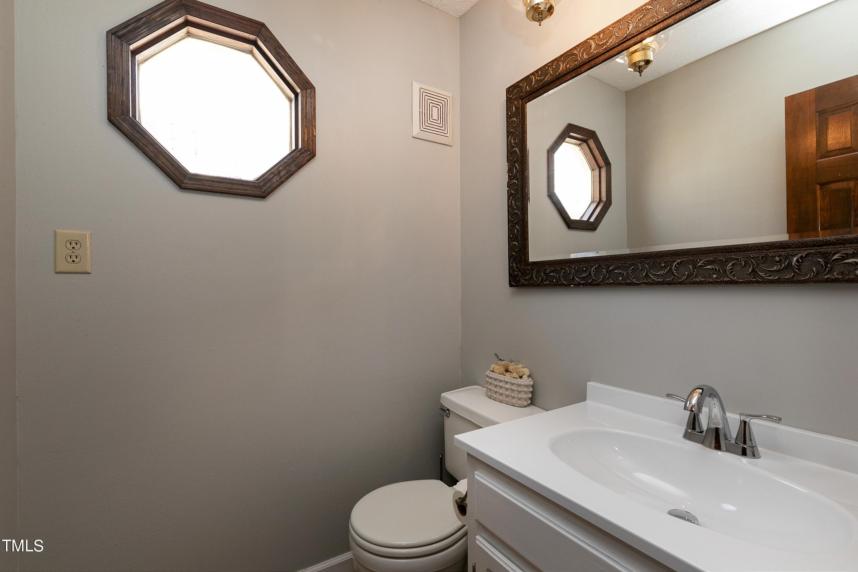 10021 Sycamore Road Raleigh, NC 27613 - Photo 19 of 40 Half bath