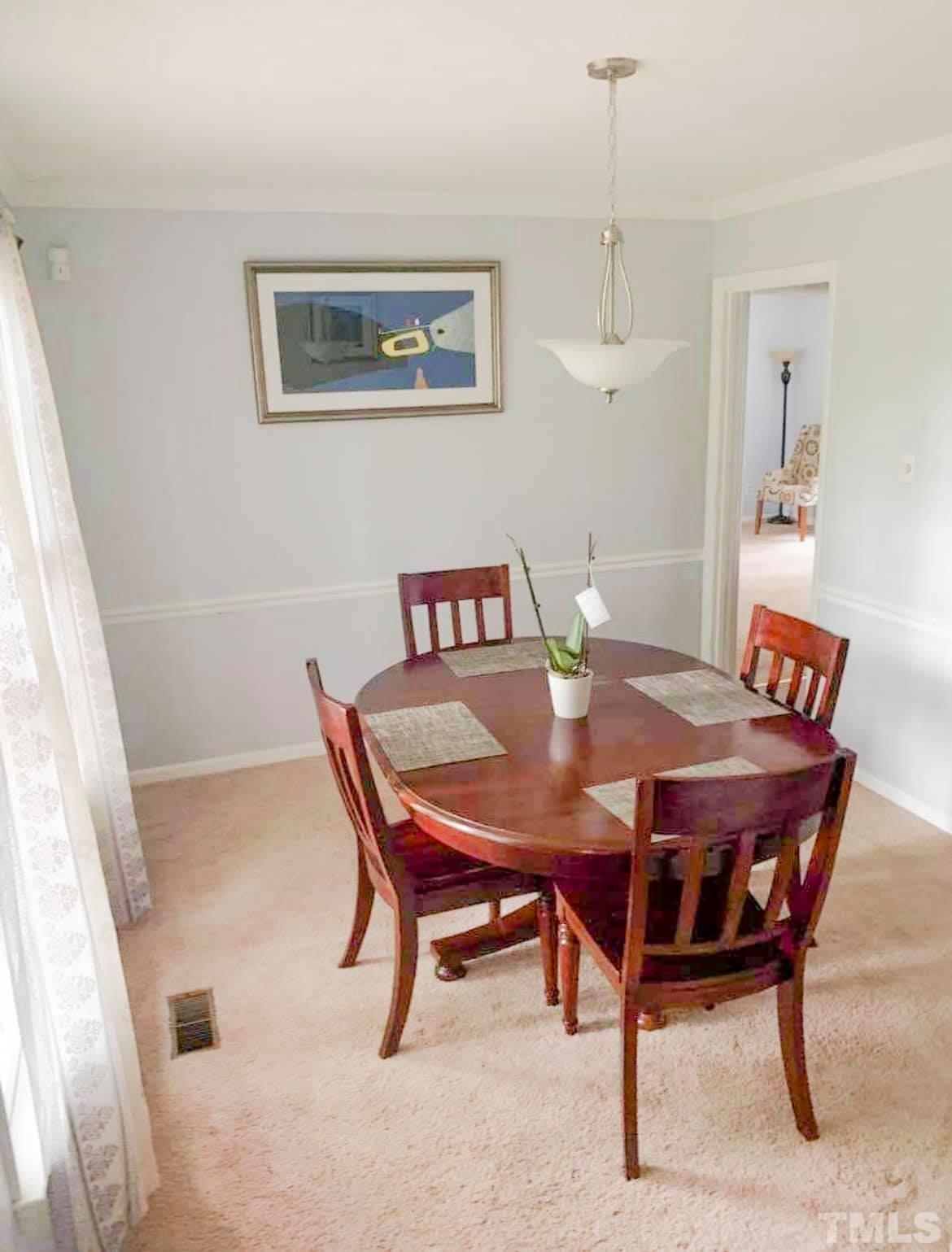5601 Russell Road Durham, NC 27712 - Photo 9 of 10 a view of a dining room with furniture