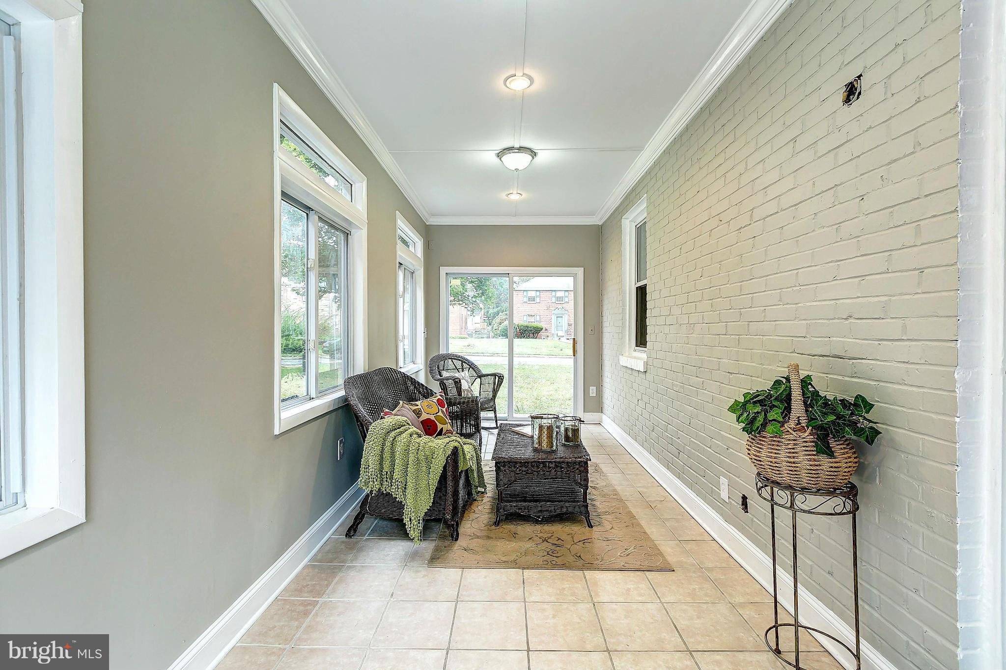 4107 Colonial Road Pikesville, MD 21208 - Photo 12 of 30 Florida Room, A Sun-filled Space to Relax