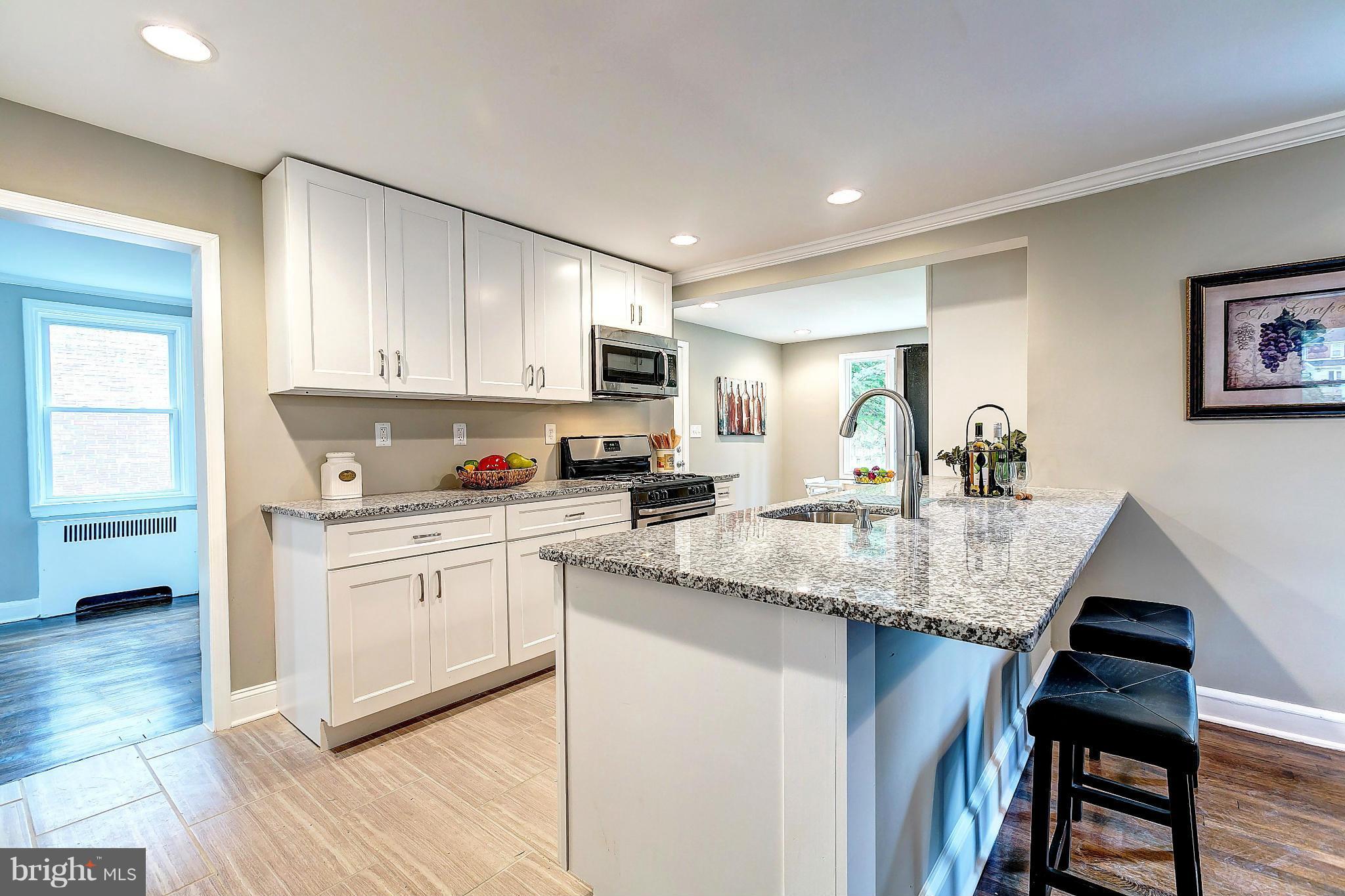 4107 Colonial Road Pikesville, MD 21208 - Photo 7 of 30 Beautiful Kitchen W/Breakfast Bar For Quick Bites!
