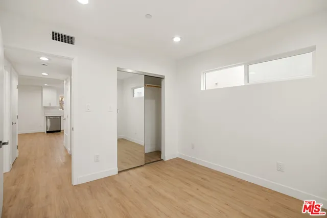 a view of a livingroom with wooden floor