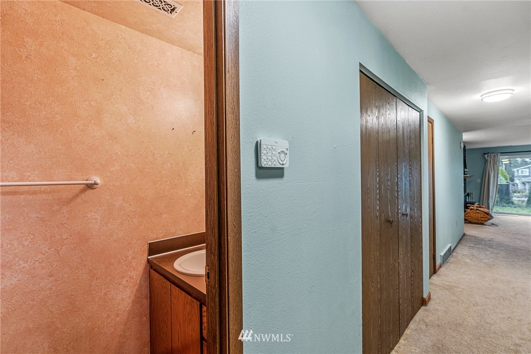 21527 4th Avenue West, Unit C43 Bothell, WA 98021 - Photo 10 of 27 a view of a hallway with closet