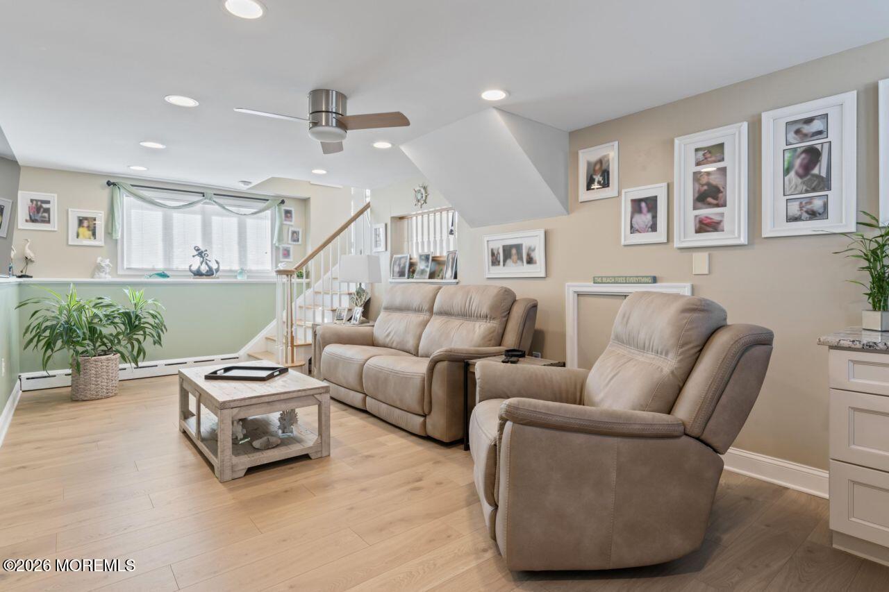 151 Riverside Drive North Brick, NJ 08724 - Photo 20 of 52 a living room with furniture and a chandelier