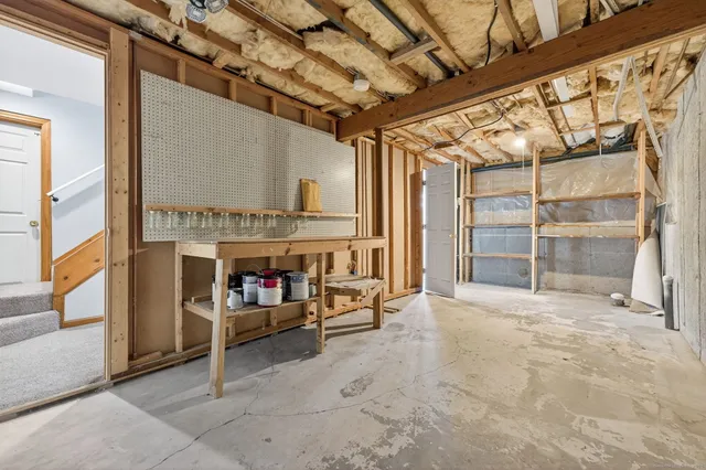 a view of balcony with wooden floor and fence