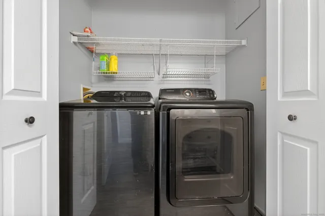 a bathroom with a sink and a window