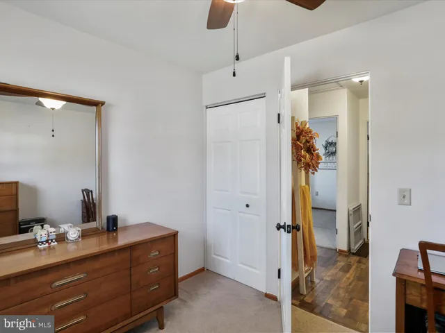 a en suite bathroom with a sink and mirror