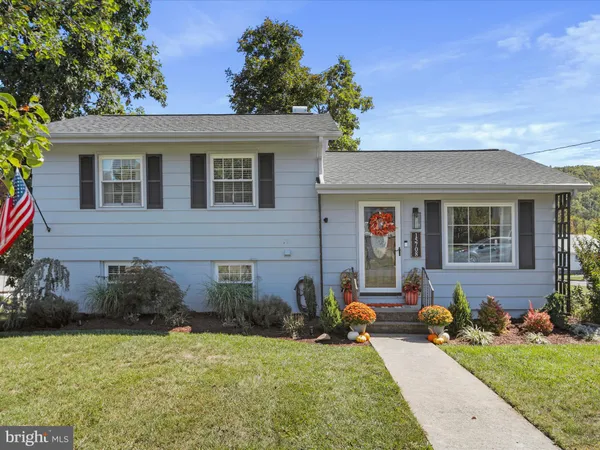 a backyard of a house with seating space