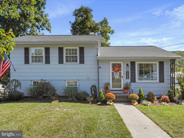 a backyard of a house with seating space