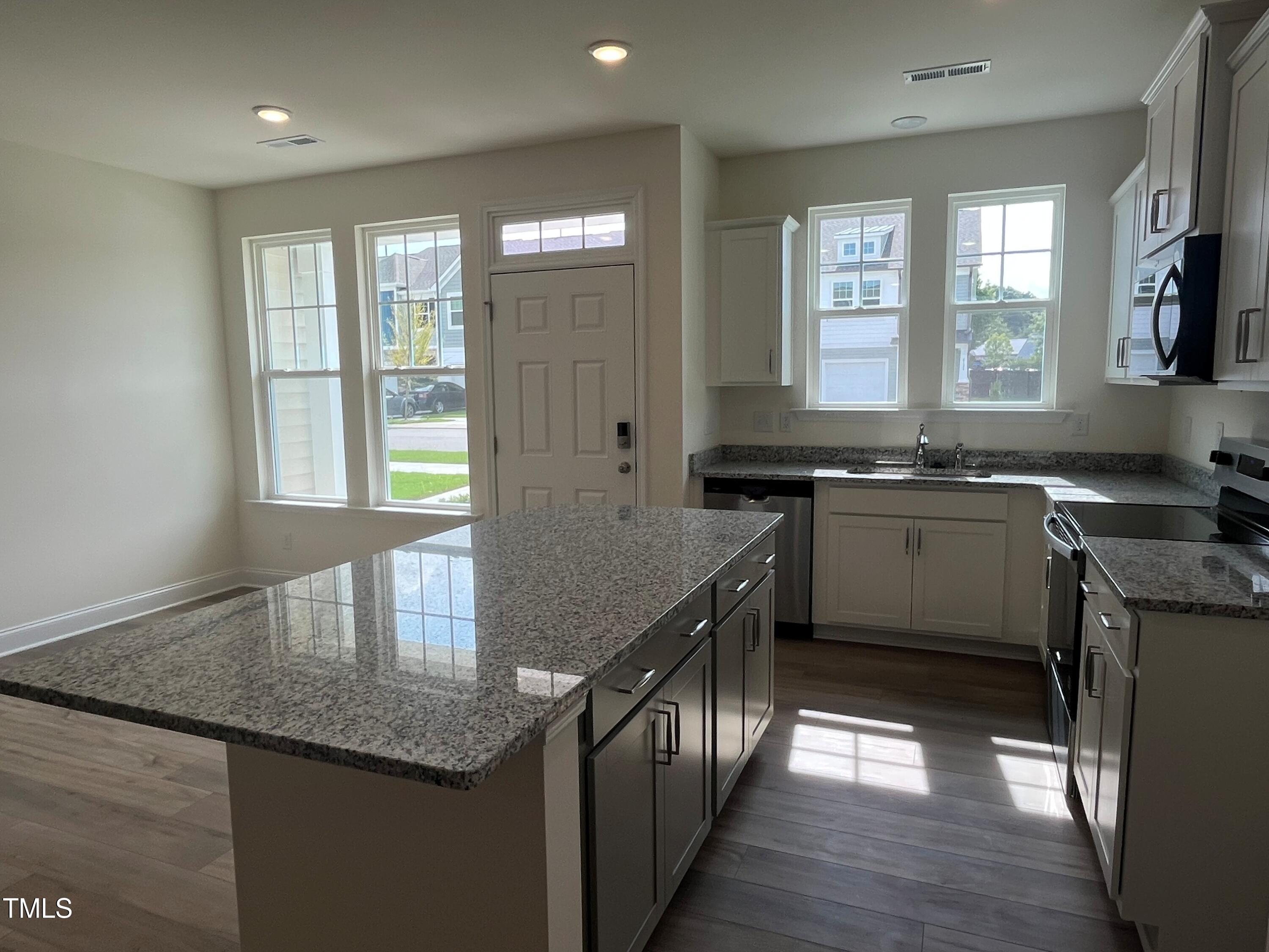 6127 Arsenal Avenue Raleigh, NC 27610 - Photo 8 of 35 Kitchen island overlooking Dining area