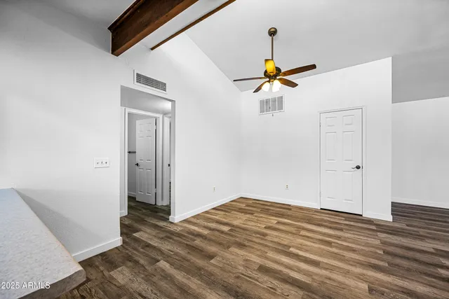 a bathroom with a granite countertop shower