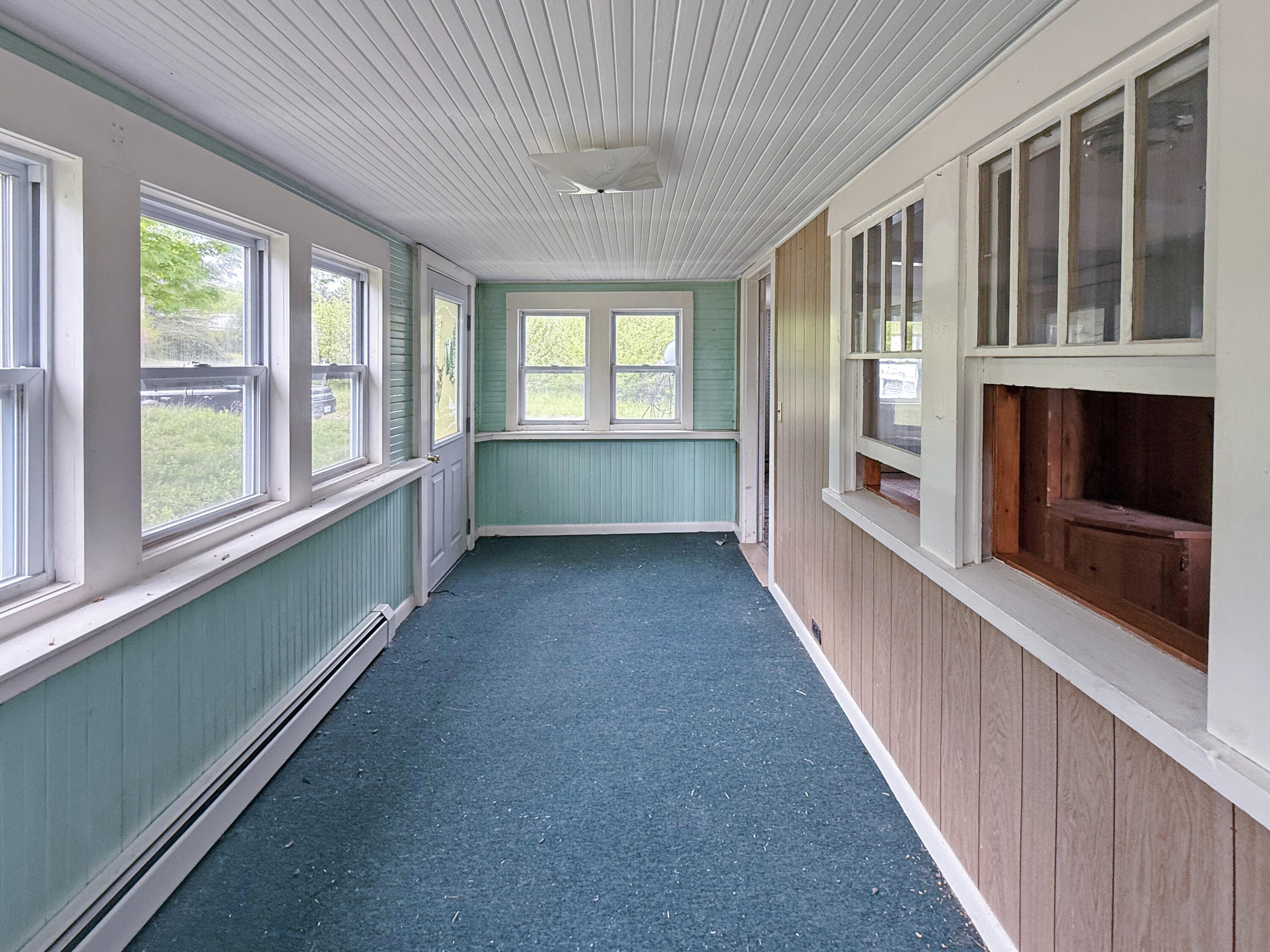 960 Main Street Wilton, ME 04294 - Photo 13 of 29 Enclosed porch