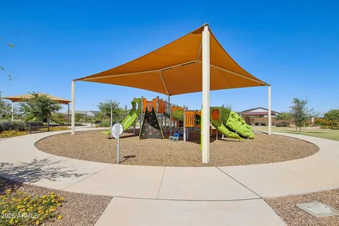 a view of swimming pool with outdoor seating
